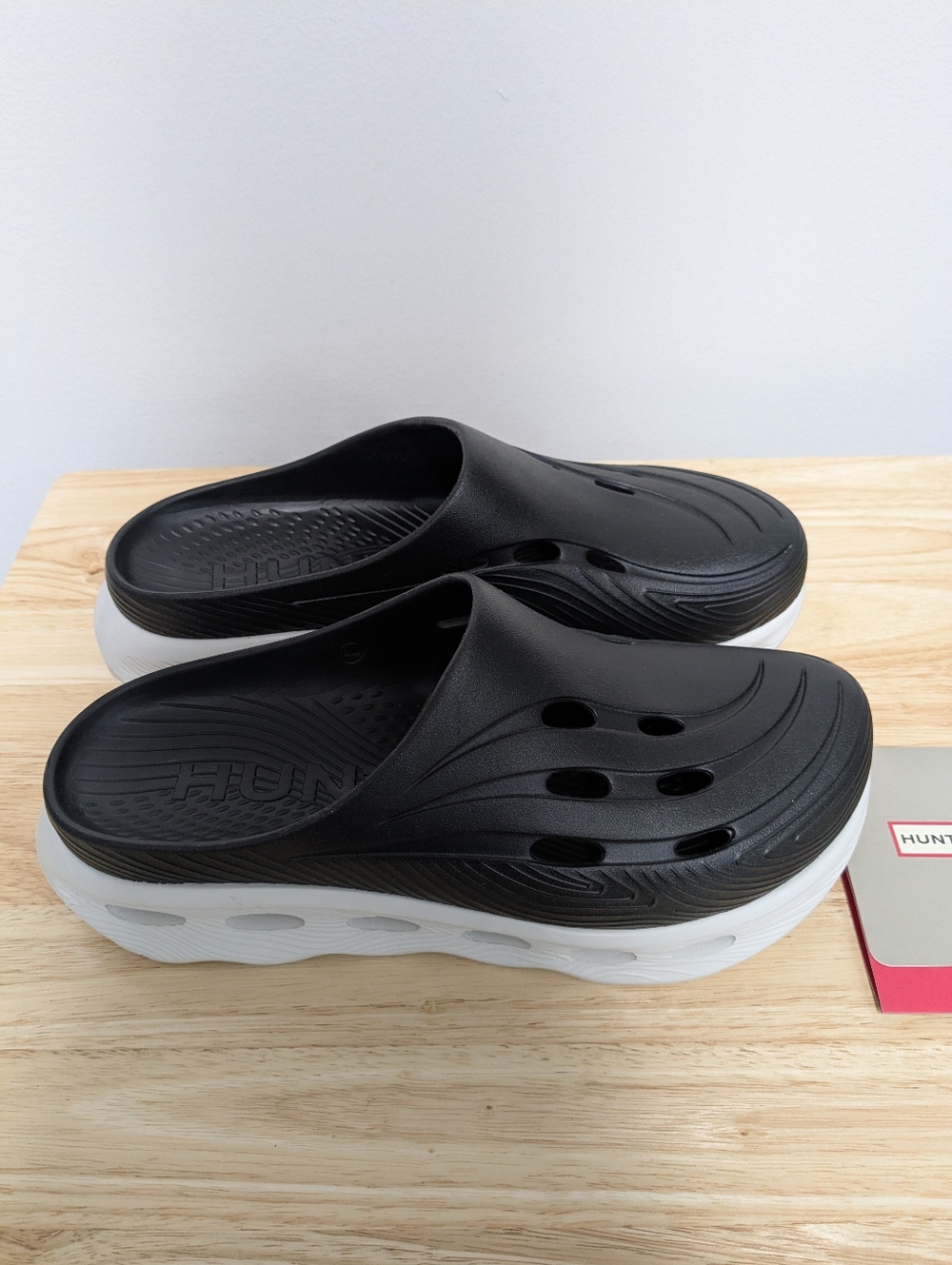 Hunter Black and White Slip-On Foam Clogs